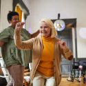 Happy Seniors Dancing in Retirement Home